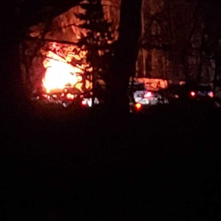 The Volvo burst into flames after hitting a boulder and a tree.