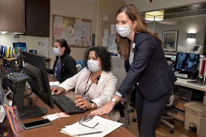 Amy Matthews, MSN, RN, NE-BC, the new chief nursing officer at Phelps Hospital in Sleepy Hollow, NY (right) next to assistant nurse manager, Laurie Bell, RN, CBC and Amanda Ramadan, a physician resident (far left).