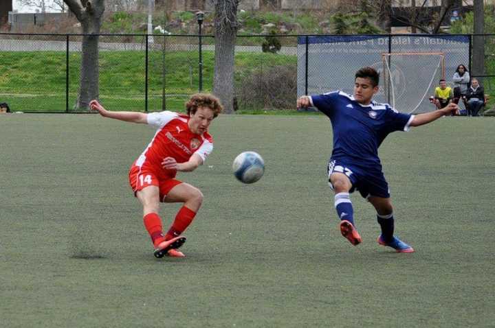 Fairfield Warde&#x27;s Jason Deck, in red, will play on an international field this summer.