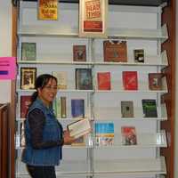 <p>Jeanette Rodriguez, reading &quot;banned books&quot; in the Kent Public Library. </p>