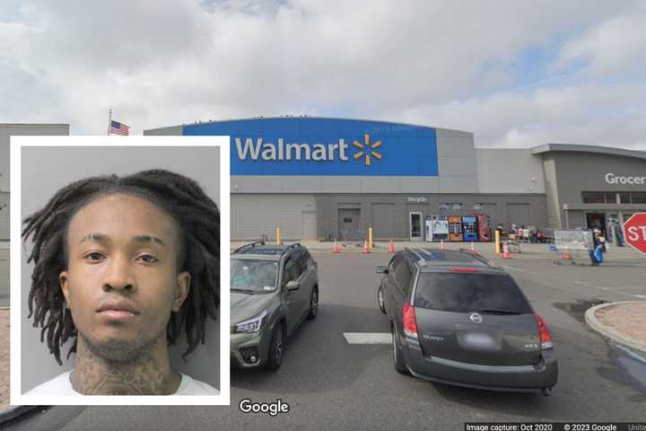 A 21-year-old man allegedly robbed a Walmart and threatened an employee with a knife when he was caught, police said.