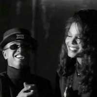 <p>Stamford business owner Jimmy Locust and pop singer Janet Jackson in the &quot;Miss You Much&quot; music video.</p>