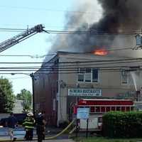 <p>The first responding firefighters found flames blowing through the cockloft on Piaget Avenue in Clifton.</p>