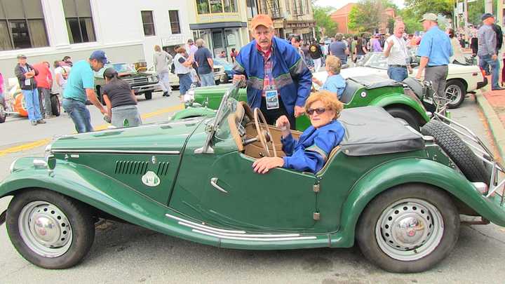 Judith Johnson in her prize-winning 1955 MG TF1500 2-door convertible.