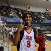 <p>Justin Price with his gold medal at the Maccabiah Games</p>