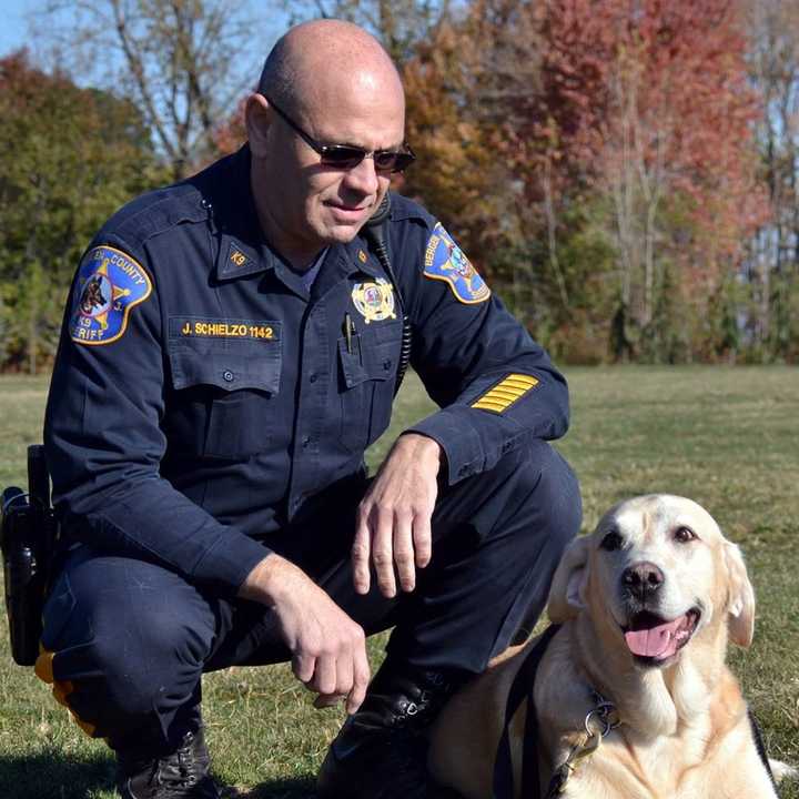 Bergen County Sheriff&#x27;s K-9 Officer James Schielzo, George