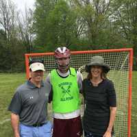 <p>Kern Byrnes, who was named US Lacrosse All-American, pictured with his parents.</p>