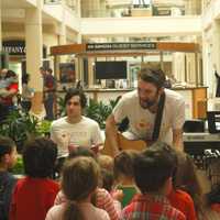 <p>Kids are encouraged to play the band&#x27;s instruments – drums, guitar, and keyboard – during a class.</p>