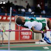 <p>Kyle Snow of Mamaroneck competing in the high jump at the indoor national youth championships on Staten Island.</p>