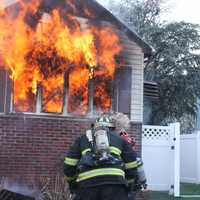 <p>Flames blew out the front windows of the Mitchell Street home in Lodi.</p>