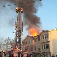 <p>Fire raced up the building.</p>