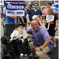 <p>Rutherford resident Steven Way and U.S. Sen. Corey Booker at a previous Labor Day Walk for Citizens with Disabilities.</p>