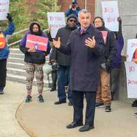 <p>State Sen. Carlo Leone (D-Stamford) attends a Wednesday rally for immigrant rights outside the courthouse in Stamford.</p>