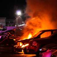 <p>Three vehicles were engulfed and three others damaged in the overnight fire Sunday, July 30, at MTF Auction on Route 46 in Lodi.</p>