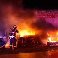 <p>Three vehicles were engulfed and three others damaged in the overnight fire Sunday, July 30, at MTF Auction on Route 46 in Lodi.</p>