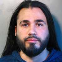 Robbery Suspect Nabbed After Punching Manager Of Long Island Lounge In Face, Police Say