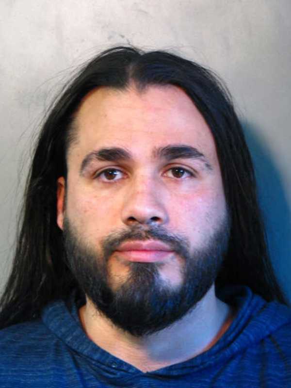 Robbery Suspect Nabbed After Punching Manager Of Long Island Lounge In Face, Police Say