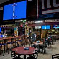 <p>The interior of The Lumberyard Pub -- a 2016 DVlicious Sports Bar winner --  is filled with lots of TVs for primetime game viewing.</p>