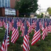 <p>Flags were displayed across the high school lawn.</p>