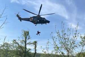 Driver Rescued By Maryland State Police Helicopter After Rollover Crash Down 80-Foot Embankment