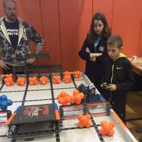 <p>Left to right: Harvey School students Wendy Lichtenberg and Clayton Collum. The students are in a middle school robotics program.</p>