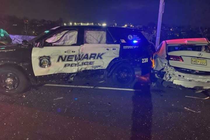 Newark Police SUV Struck By Speeding Car At Crash Scene Injuring 7