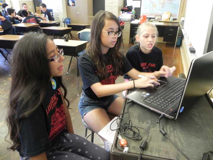 From left, Madeline Murillo, Angela Kohout, and Elizabeth Sagi, are authors of a self-published book they created while they were students at Cliffside Park School No. 3.