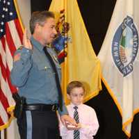 <p>New Monmouth County SPCA Lt. Michael Magliozzo with his son.</p>