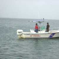 <p>Southampton Bay Constables are searching for a man who jumped into the water to swim across the inlet and disappeared.</p>