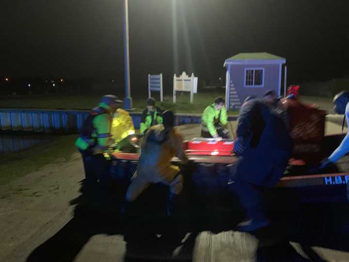 Father and son rescued from boat stranded on Bellport Bay