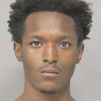 Freeport Man Charged After Handgun Found In Garbage Can In Uniondale, Police Say