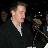 <p>Matthew Skolnick, a college student, had the honor of lighting one of the four candles during Wayne&#x27;s menorah lighting ceremony.</p>