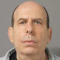 Long Island Man Nabbed With 18 Handguns, Police Say