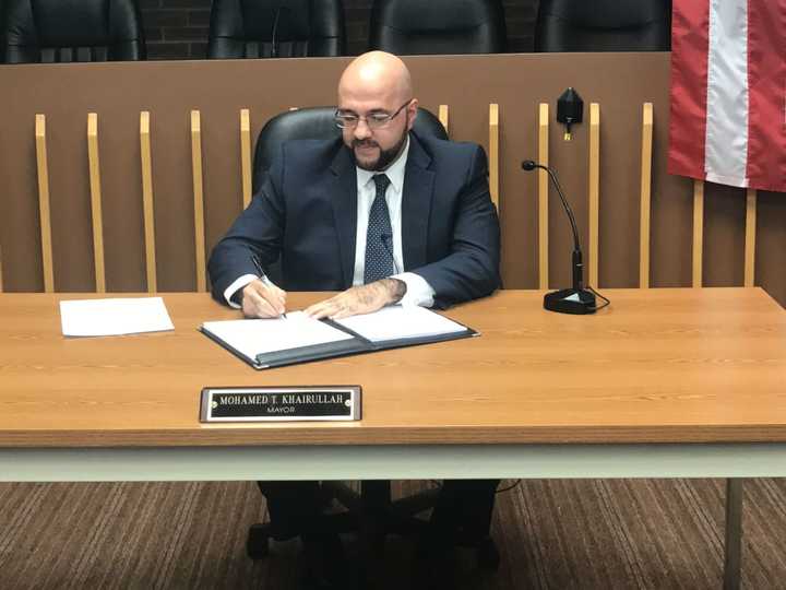 Prospect Park Mayor Mohamed T. Khairullah signs an executive order upholding the borough&#x27;s anti-discrimination policies.