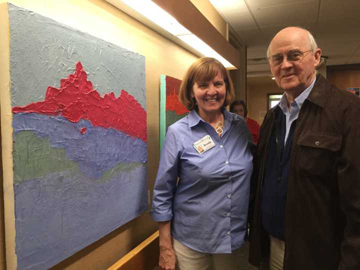 Brenda Jacobsen, Therapeutic Recreation Leader, showcases her own collection of work in the halls of Waveny, the organization she serves.