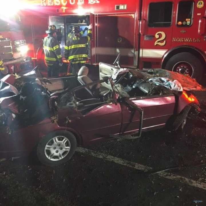 A woman received life-threatening injuries after being extricated from a vehicle following a crash.