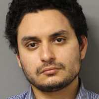 Long Island Man Accused Of Attacking Cop During Disturbance, Police Say