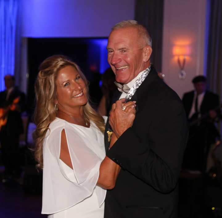 Monroe couple, Michele Macauda and husband Richard Burke, the gala&#x27;s co-chairs, dance at the Kennedy Center’s 52nd Annual Four Seasons Ball at Rolling Hills Country Club in Wilton.