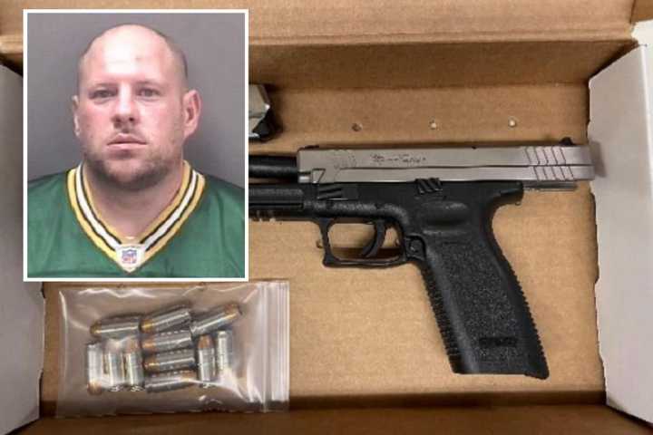 Joseph Kenyhercz, aged 40, was arrested for possessing a stolen firearm, which officers said they discovered when he fell asleep behind the wheel of his car in a Wendy&#x27;s parking lot.