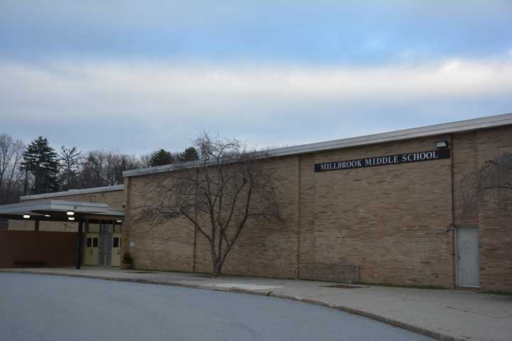 Millbrook Middle School Holding Ribbon Cutting For Garden