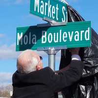 <p>Elmwood Park dedicated Mola Boulevard in the memory of longtime mayor Richard Mola.</p>