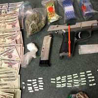 <p>The drugs and gun seized.</p>