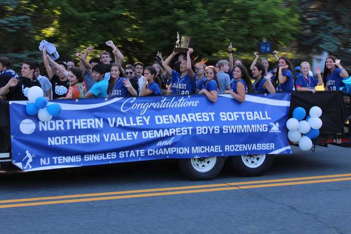 State singles tennis champion Michael Rozenvasser along with the state champion softball and boys swimming team