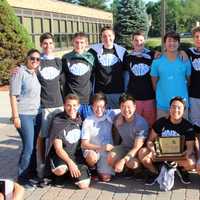 <p>Coach Sam Puso and the Group C state champion boys swim team of Northern Valley/Demarest</p>