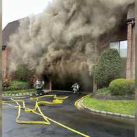 Several Departments Battle Long Island Condo Fire