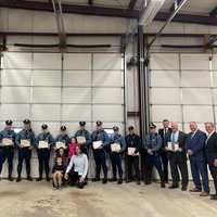 <p>Members of the Massachusetts State Police who assisted in the search for Owen Goderre pictured here along with Owen, his parents, Andrew Goderre and Samantha Kendall, and Col. Mawn and District Attorney Early.
  
</p>