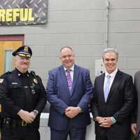 <p>(from left) Oakham Police Chief Frederick Gehring, Colonel John Mawn Jr., Superintendent of the Massachusetts State Police, District Attorney Joseph D. Early, Jr., Massachusetts State Police Capt. Keith Egan.
  
</p>