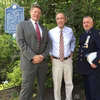 <p>Oakland council candidates Eric Kulmala and Robert Knapp Jr. flank U.S. Rep. Scott Garrett.</p>
