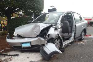 Driver Freed From Car After Crashing Into Pole In Westport