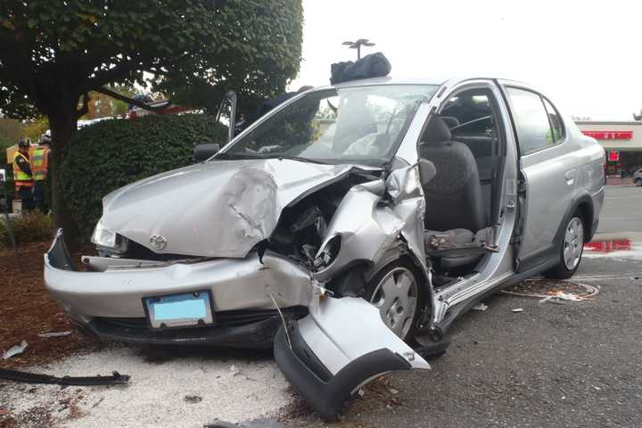 Driver Freed From Car After Crashing Into Pole In Westport